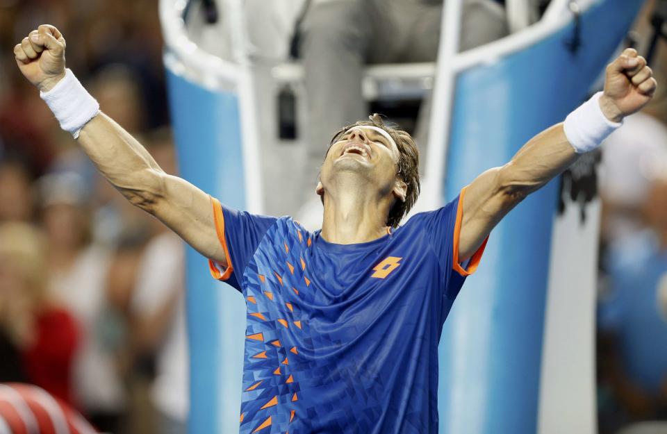 Spain's David Ferrer celebrates after winning his fourth round match against John Isner of the U.S. at the Australian Open tennis tournament at Melbourne Park, Australia, January 25, 2016. REUTERS/Brandon Malone