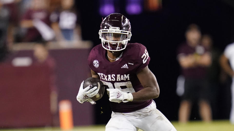 Texas A&M running back Isaiah Spiller (28) breaks free for a first down against South Carolina during the second half of an NCAA college football game on Saturday, Oct. 23, 2021, in College Station, Texas. (AP Photo/Sam Craft)