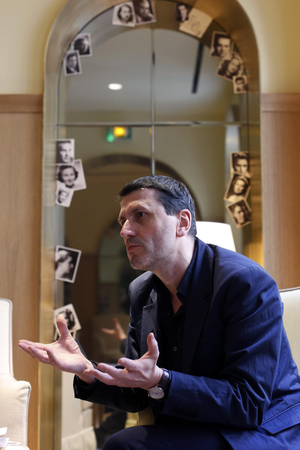 French writer Frederic Martel gestures during an interview with Associated Press, in Paris, Friday, Feb. 15, 2019. In the explosive book "In the Closet of the Vatican" author Frederic Martel describes a gay subculture at the Vatican and calls out the hypocrisy of Catholic bishops and cardinals who in public denounce homosexuality but in private lead double lives. (AP Photo/Thibault Camus)