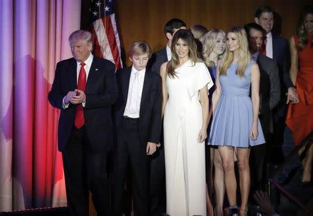 U.S. President-elect Donald Trump, his wife Melania, daughter Ivanka, son Barron and other family members greet supporters during his election night rally in Manhattan, New York, U.S., November 9, 2016. REUTERS/Mike Segar