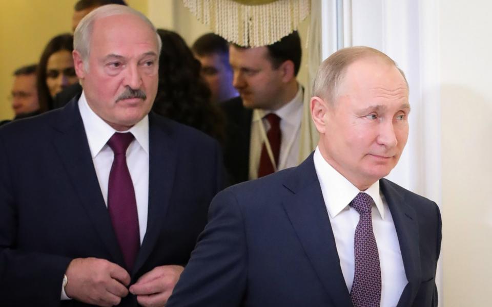 Russian President Vladimir Putinand Alexander Lukashenko in December last year