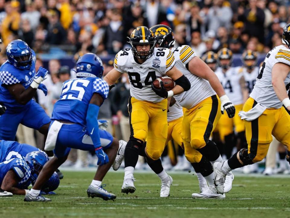 Iowa senior and Highland product Sam LaPorta heads upfield after hauling in a pass against Kentucky during the Music City Bowl on Dec. 31, 2022. LaPorta now is gearing up for the NFL draft.