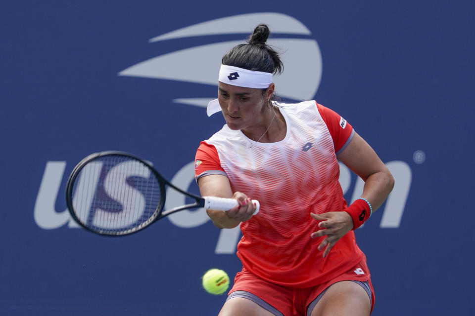 Ons Jabeur, of Tunisia, returns a shot to Elizabeth Mandlik, of the United States, during the second round of the US Open tennis championships, Wednesday, Aug. 31, 2022, in New York. (AP Photo/Seth Wenig)
