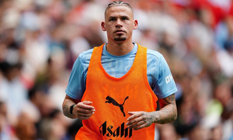 <span>Kalvin Phillips warms up during Saturday’s Community Shield at Wembley but is surplus to requirements at Manchester City.</span><span>Photograph: Zac Goodwin/PA</span>