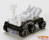 Mattel's Hot Wheels Mars Rover Curiosity is a 1:64 scale version of NASA's Mars Science Laboratory. NASA's real-life Mars rover Curiosity lands on Mars on Aug. 5/6, 2012.