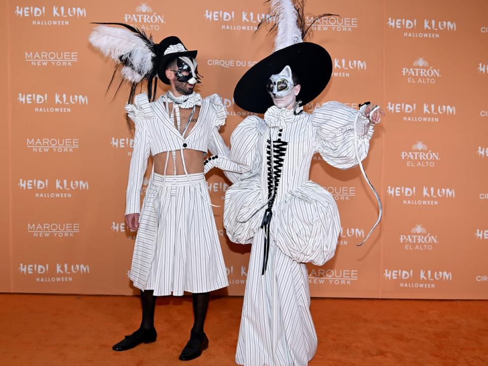 Christian Siriano and his guest as theatrical cats (Getty Images for Heidi Klum)