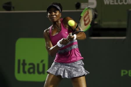 Mar 30, 2017; Miami, FL, USA; Venus Williams of the United States hits a backhand against Johanna Konta of Great Britain (not pictured) in a women's singles semi-final during the 2017 Miami Open at Crandon Park Tennis Center Mandatory Credit: Geoff Burke-USA TODAY Sports