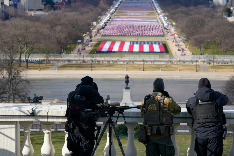 Law enforcement personnel monitoring surrounding areas during the 59th Presidential Inauguration on the West Front of the U.S. Capitol on January 20, 2021 in Washington, DC.