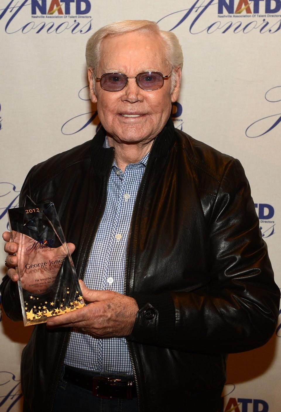 NASHVILLE, TN - NOVEMBER 14: Singer/Songwriter George Jones and his NATD Award during the 2012 NATD Honors at The Hermitage Hotel on November 14, 2012 in Nashville, Tennessee. (Photo by Rick Diamond/Getty Images for Nashville Association of Talent Directors)