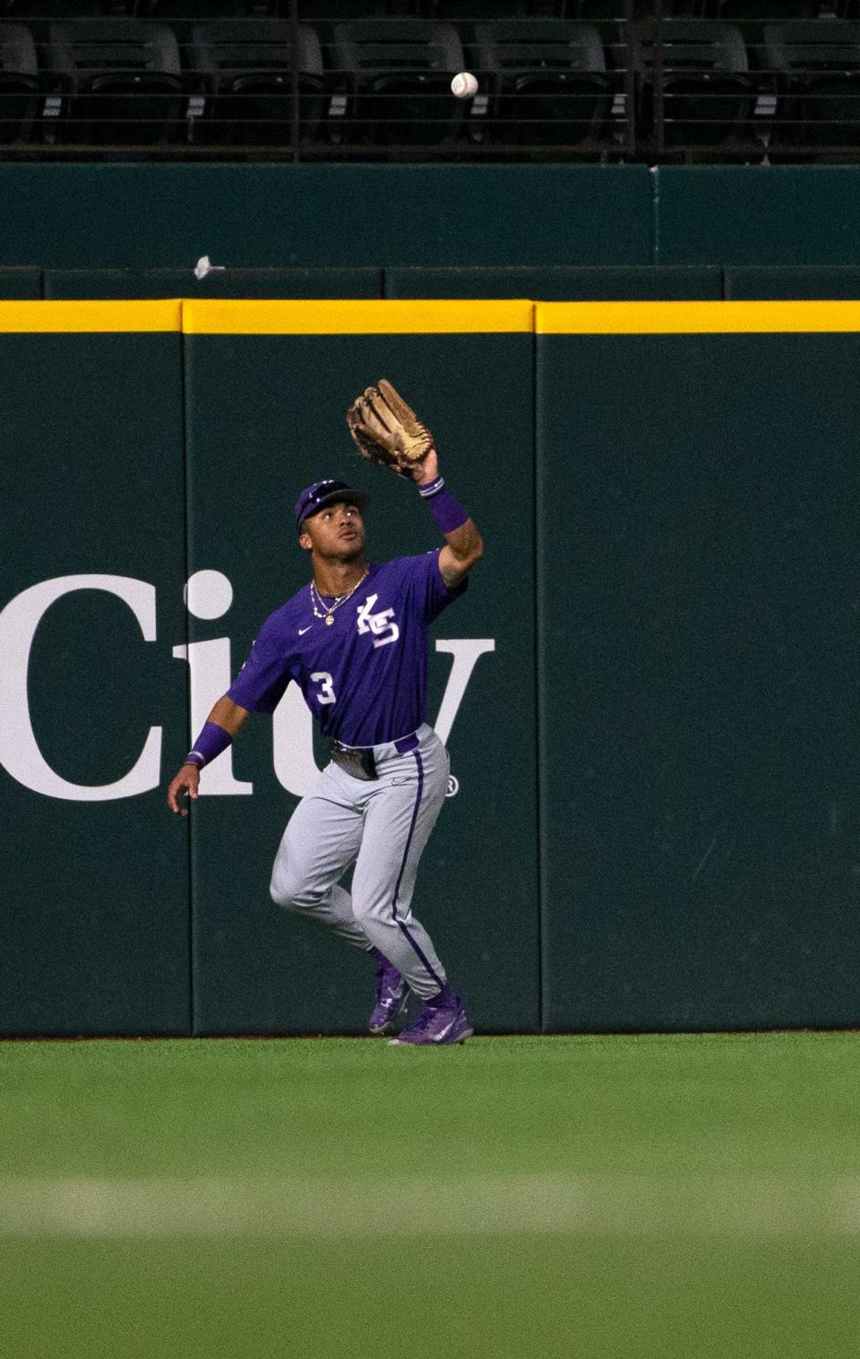 Kansas State's Dom Johnson (3) prepares to catch the ball against Texas Tech in an elimination game of the Big 12 baseball tournament, Friday, May 27, 2022, at Globe Life Field in Arlington.  Kansas State won, 6-5, in 11 innings.