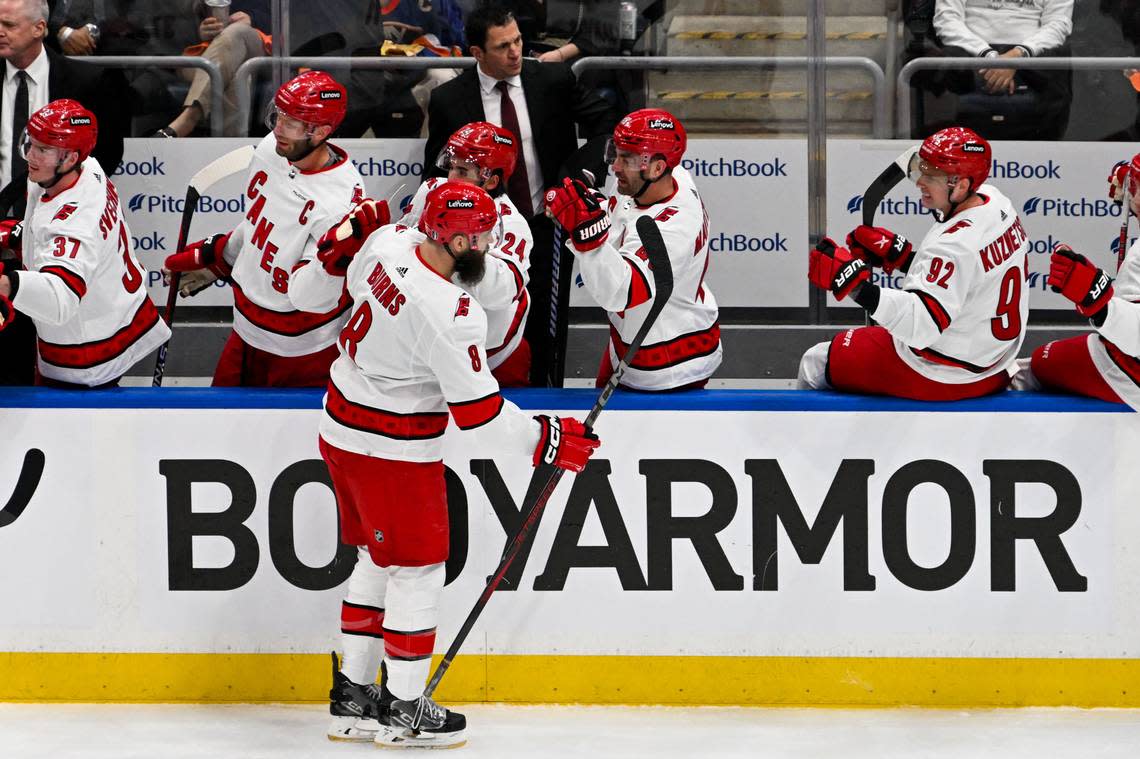 Apr 25, 2024; Elmont, New York, USA; Carolina Hurricanes defenseman Brent Burns (8) celebrates his goal against the New York Islanders during the first period in game three of the first round of the 2024 Stanley Cup Playoffs at UBS Arena. Mandatory Credit: Dennis Schneidler-USA TODAY Sports Dennis Schneidler/Dennis Schneidler-USA TODAY Sports