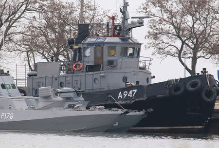 FILE PHOTO: Seized Ukrainian ships are seen anchored in the port of Kerch, Crimea, Nov. 26, 2018. REUTERS/Pavel Rebrov/File Photo