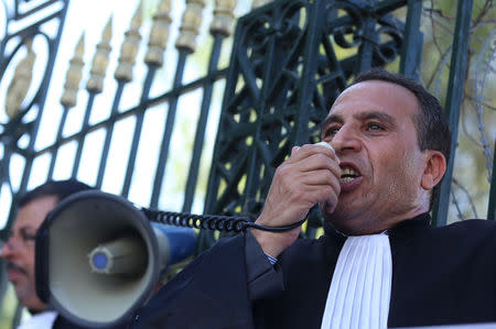 Tunisian lawyers demonstrate against the government's proposed new taxes outside parliament in Tunis, Tunisia November 23, 2016. REUTERS/Zoubeir Souissi