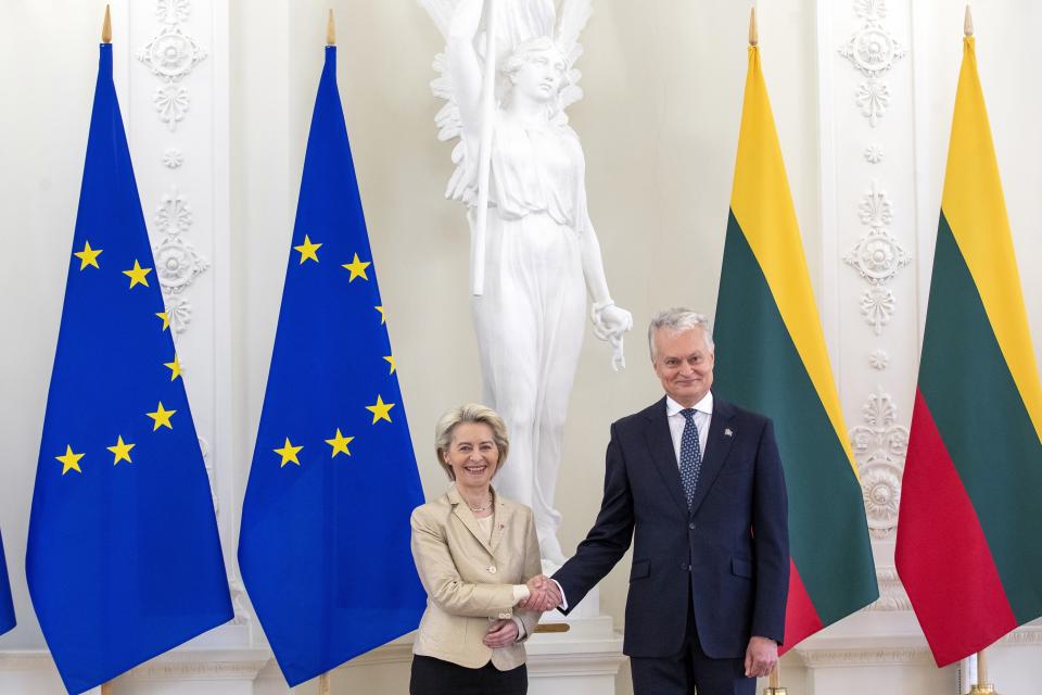 Lithuania's President Gitanas Nauseda, right, and European Commission President Ursula von der Leyen, left, pose for a photo prior to their talks at the President's palace in Vilnius, Lithuania, Thursday, May 9, 2024. (AP Photo/Mindaugas Kulbis)