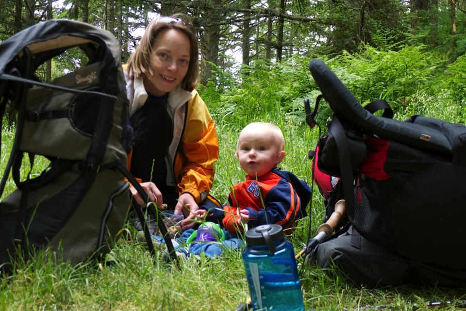 In this undated publicity photo provided by Stroller Hikes, Debbie Frazier, left, and her daughter, Holly, enjoy a break during a hike at Point Reyes National Seashore near Olema, Calif. The hike was part of the Backpacking Bambinos series, sponsored by Stroller Hikes. Created by Frazier, the not-for-profit organization is dedicated to facilitating nature and exercise outings for families. (AP Photo/Courtesy Stroller Hikes, Debbie Frazier)