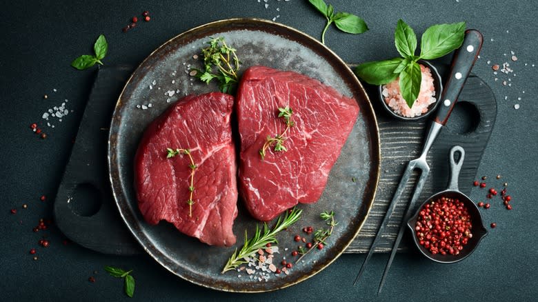 raw veal on cutting board