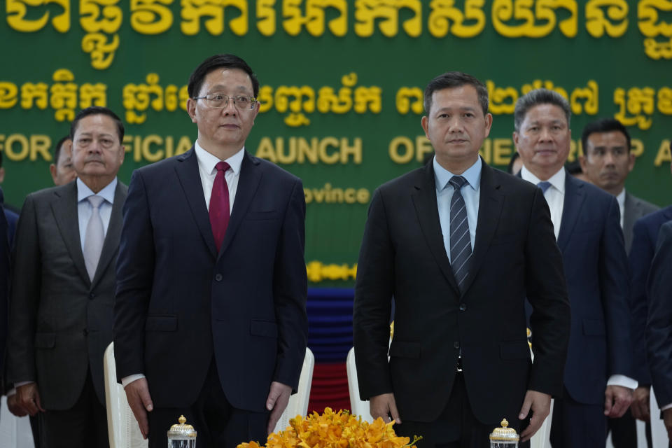 Cambodian Prime Minister Hun Manet, front right, and Wang Yubo, Chinese governor of Yunnan province, attend an inauguration ceremony of Cambodia’s newest and biggest airport, Siem Reap Angkor International Airport in Siem Reap province, Cambodia, Thursday, Nov. 16, 2023. The new airport can handle 7 million passengers a year, with plans to augment it to handle 12 million passengers annually from 2040. It was constructed under a 55-year build-operate-transfer (BOT) program between Cambodia and China. (AP Photo/Heng Sinith)