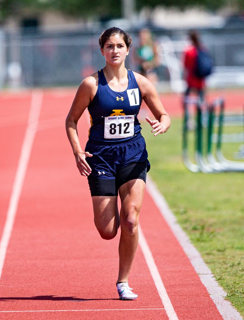 LehighÕs Gianna Del Pizzo wins the 1600 meters at the Lee County Athletic Championships at Dunbar High School on Saturday, April 9, 2022. 