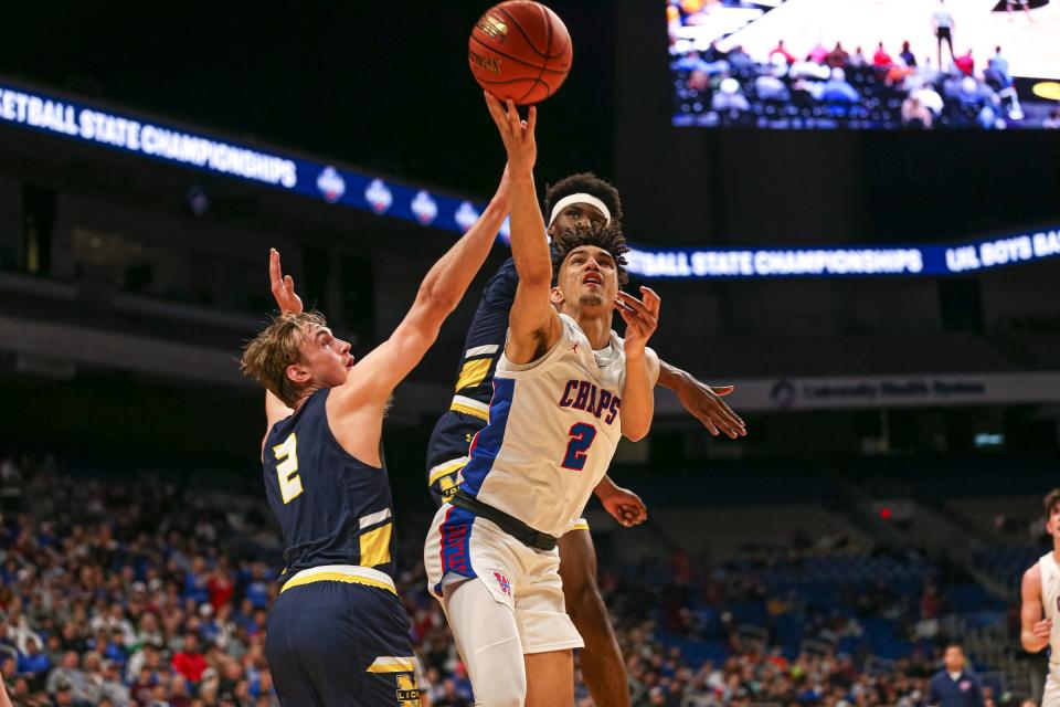 Forward Donovan Santoro, playing for Westlake High last March, gets off a shot during a Class 6A semifinal game against McKinney High.