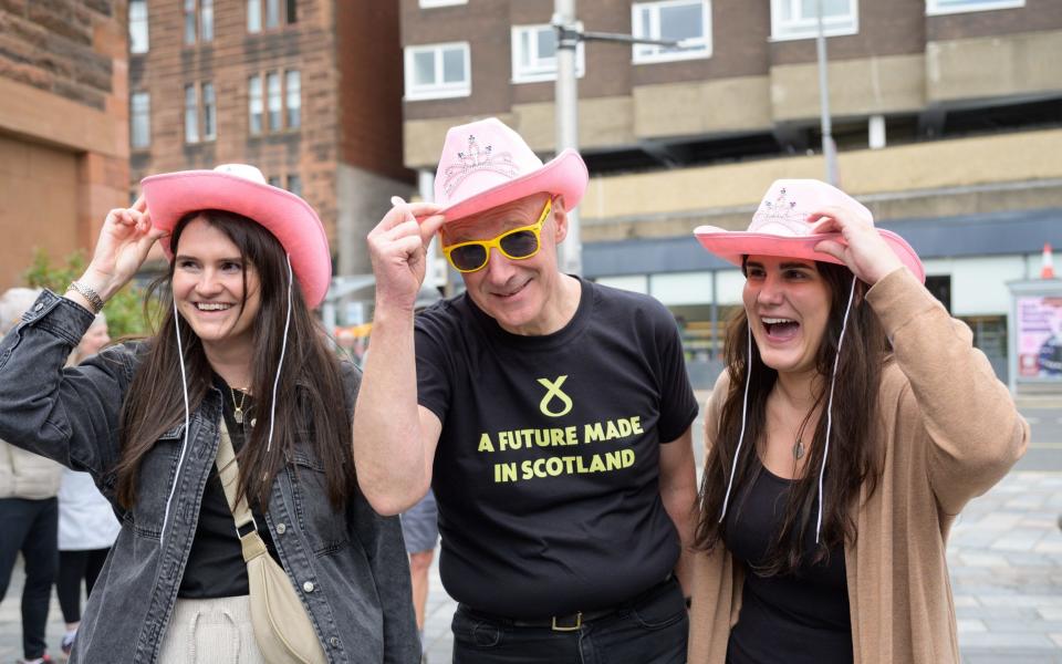 John Swinney, the SNP leader and Scottish First Minister, on the campaign trail in Glasgow