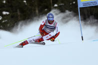 Austria's Marco Schwarz speeds down the course during the super G portion of an alpine ski, men's World Championship combined race, in Courchevel, France, Tuesday, Feb. 7, 2023. (AP Photo/Marco Trovati)