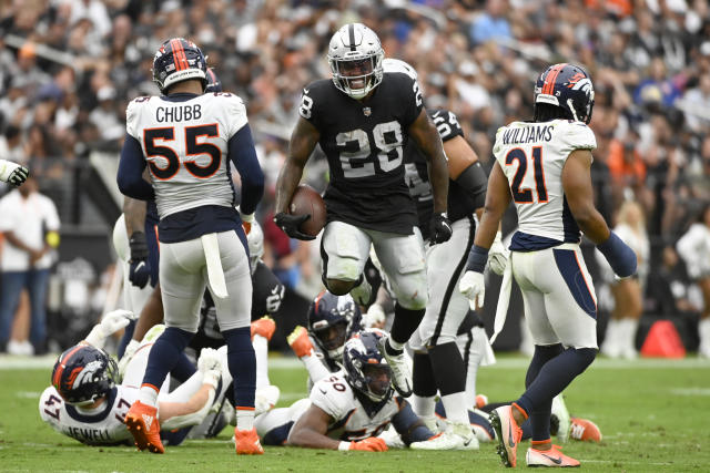 Jacobs, defense lead Raiders to 1st win, 32-23 over Broncos