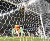 Germany's Andre Schuerrle (9) scores past Algeria's goalkeeper Rais Mbolhi during their 2014 World Cup round of 16 game at the Beira Rio stadium in Porto Alegre June 30, 2014. REUTERS/Stefano Rellandini