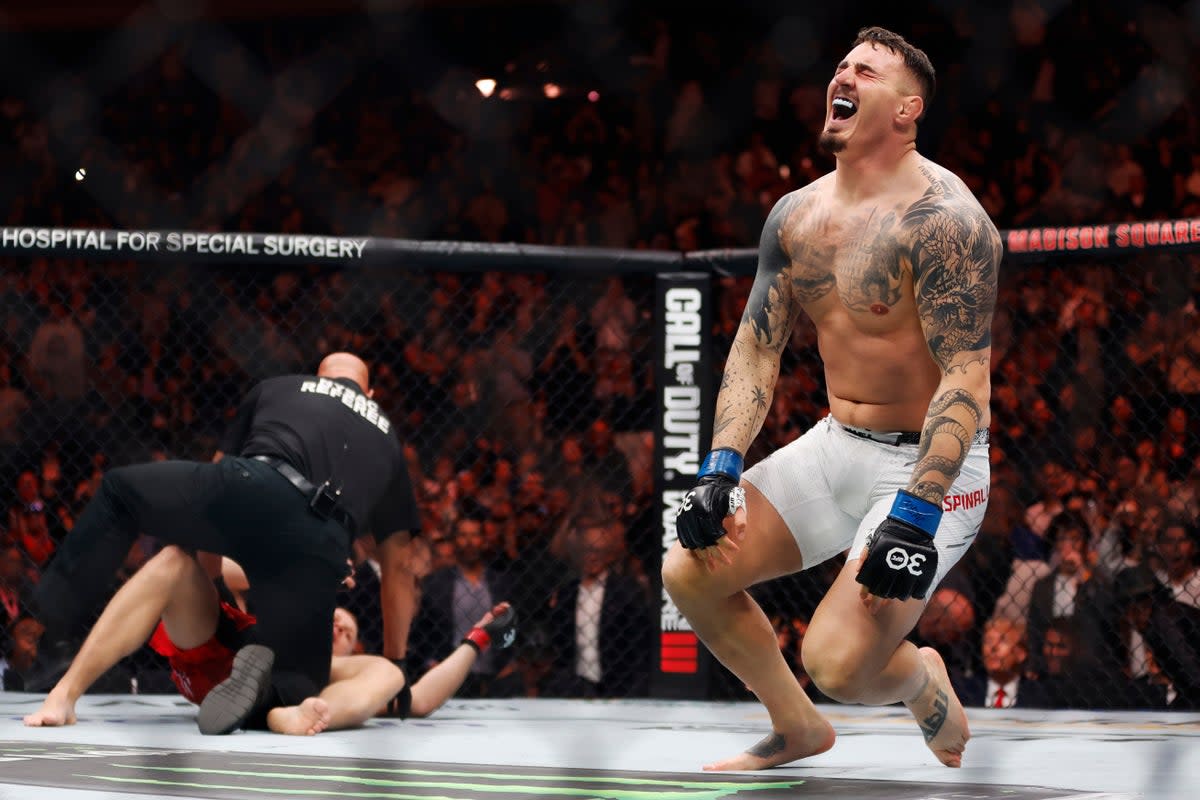 An emotional Tom Aspinall reacts to his UFC interim title win (Getty Images)