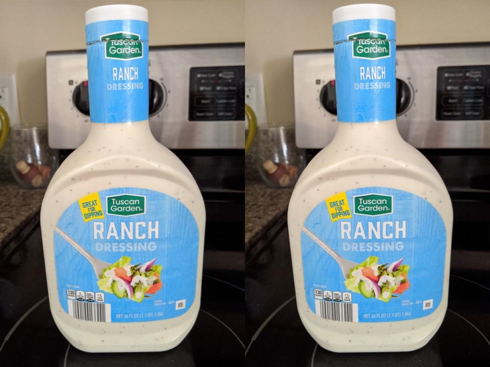 Clear bottles of Tuscan Garden ranch dressing on an electric stove