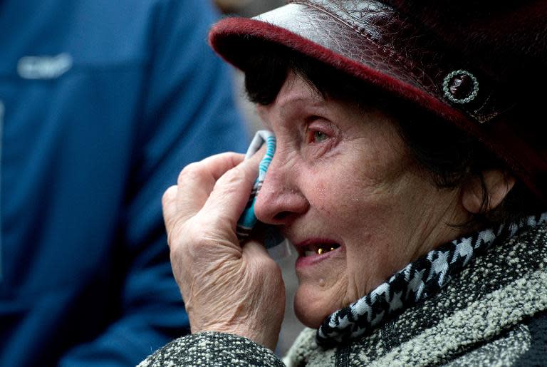 Valentina Dzuba, 72, mother of a miner, cries outside the Zasyadko mine in Donetsk after the mine was rocked by an explosion on March 4, 2015