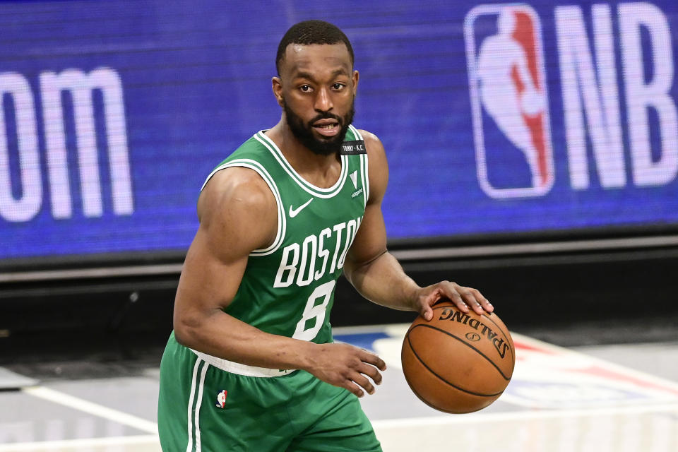 Kemba Walker dribbles the ball during a game.