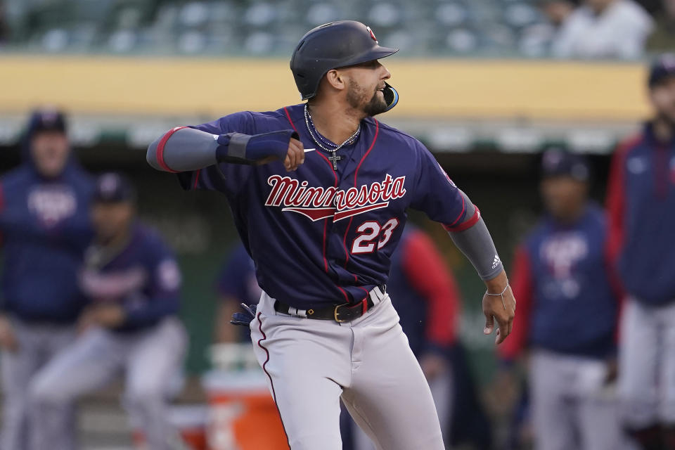 Minnesota Twins' Royce Lewis reacts after scoring against the Oakland Athletics during the third inning of a baseball game in Oakland, Calif., Monday, May 16, 2022. (AP Photo/Jeff Chiu)