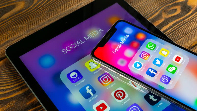 Federal judges in Ohio, Arkansas, and California blocked state-level social media laws aimed at protecting children’s online privacy. An Apple iPad and iPhone X with icons of social media facebook, instagram, twitter, snapchat application on screen sit on a table.