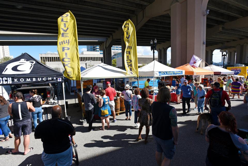 The Riverside Arts Market is held Saturdays under the Fuller Warren Bridge.