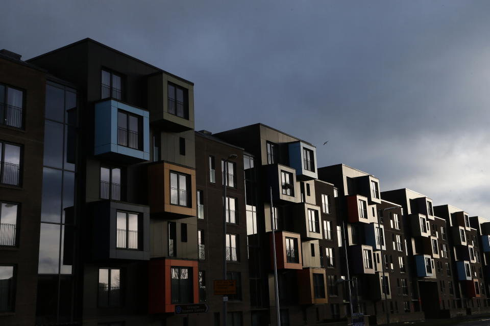 Apartment housing blocks are seen in Govan, Glasgow, Scotland January 16, 2014. The British shipbuilding industry has been through a turbulent time after defence contractor BAE Systems announced in November that it planned to lay off 1,775 ship workers across the UK. The cuts signal the end of more than 500 years of shipbuilding in Portsmouth on England's south coast. BAE is set to continue constructing ships in Glasgow, but showy entertainment venues, museums and new housing blocks have replaced many of the shipyards that once lined the city’s famous River Clyde. Long gone are the days when the area was an industrial powerhouse producing around a fifth of the world's ships. Now Glasgow promotes itself instead as a financial and commercial hub – although it still struggles with high unemployment. Picture taken January 16, 2014. REUTERS/Stefan Wermuth (BRITAIN - Tags: BUSINESS EMPLOYMENT SOCIETY REAL ESTATE)  ATTENTION EDITORS: PICTURE 14 OF 26 FOR PACKAGE 'BRITAIN'S SHIPBUILDING LEGACY' SEARCH 'WERMUTH SHIPBUILDING'  FOR ALL PICTURES PXP01-PXP26