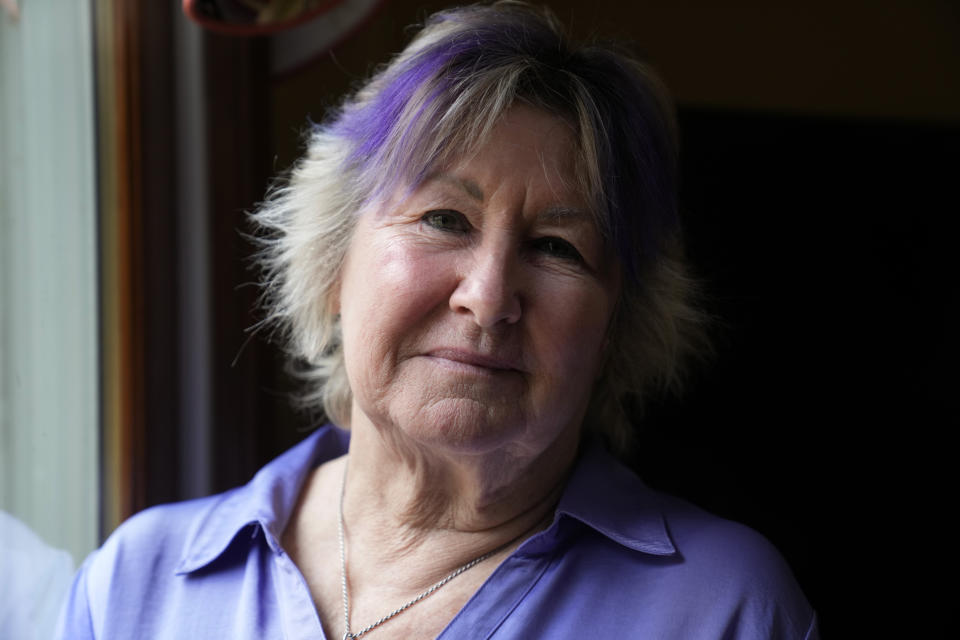 Lynn Wencus, of Wrentham, Mass., stands for a photograph at her home, in Wrentham, Tuesday, Nov. 7, 2023. Wencus lost her son Jeff to a heroin overdose in 2017. (AP Photo/Steven Senne)