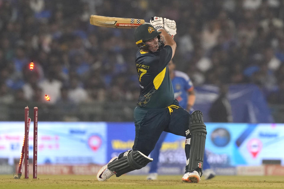 Australia's Ben McDermott is bowled out by India's Axar Patel during the fourth T20 cricket match between Australia and India in Raipur, India, Friday, Dec. 1, 2023. (AP Photo/Mahesh Kumar A.)