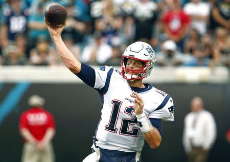 Sep 16, 2018; Jacksonville, FL, USA; New England Patriots quarterback Tom Brady (12) throws a pass during the second half against the Jacksonville Jaguars at TIAA Bank Field. Mandatory Credit: Reinhold Matay-USA TODAY Sports