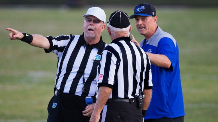 Park Vista football coach Brian Dodds talks to the officials after a 4th and goal play by his offense was ruled short against Wellington in Lake Worth, Florida, September 7, 2018. (Greg Lovett / The Palm Beach Post)