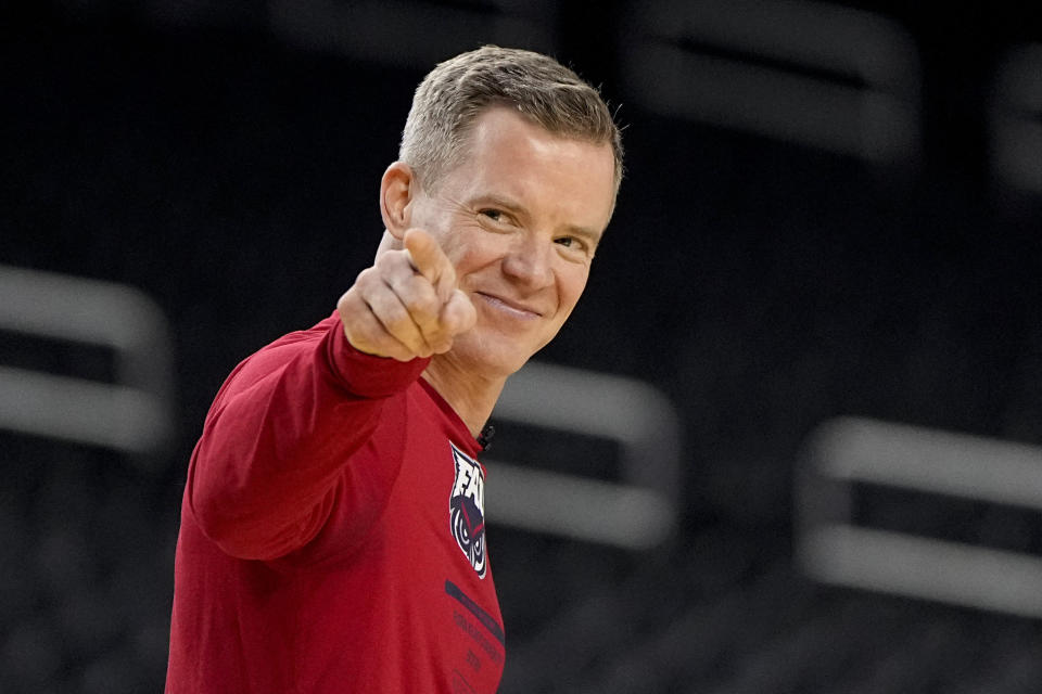 Florida Atlantic head coach Dusty May arrives at practice for their Final Four college basketball game in the NCAA Tournament on Friday, March 31, 2023, in Houston. San Diego State and Florida Atlantic play on Saturday. (AP Photo/David J. Phillip)