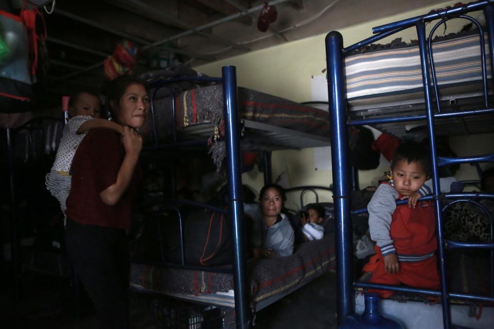 Migrants rest in a dormitory of the Good Samaritan shelter in Juarez, Mexico, Tuesday, March 29, 2022. The vast majority of people staying at the shelter are women and their children from Mexico and Central America who have been expelled under Title 42 authority or were still waiting to try for asylum, according to Pastor Juan Fierro, the shelter’s director. (AP Photo/Christian Chavez) ORG XMIT: XLAT401