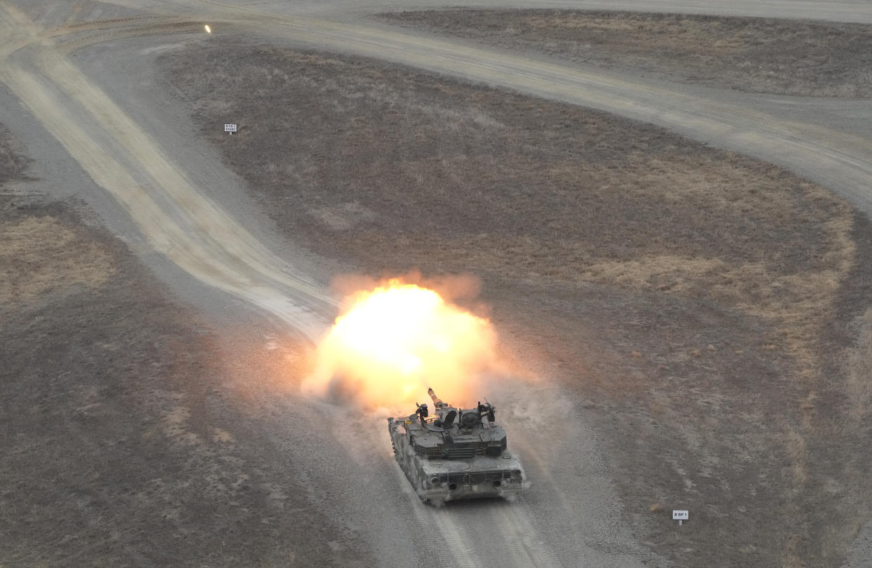 A South Korean army K1A1 tank fires during a combined live fire exercise between South Korea and the United States at Rodriguez Live Fire Complex in Pocheon, South Korea, Wednesday, March 22, 2023. North Korea launched multiple cruise missiles toward the sea on Wednesday, South Korea's military said, three days after the North carried out what it called a simulated nuclear attack on South Korea. (AP Photo/Ahn Young-joon)