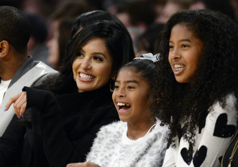 Vanessa Laine Bryant and daughters Gianna Bryant and Natalia Bryant watch Kobe Bryant during a game against the Indiana Pacers at Staples Center November 29, 2015, in Los Angeles, California. (Photo by Kevork Djansezian/Getty Images)