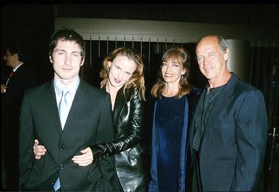 Juliette Lewis and her father Geoffrey Lewis with their adoring escorts at the Egyptian Theater premiere of Artisan's The Way of the Gun