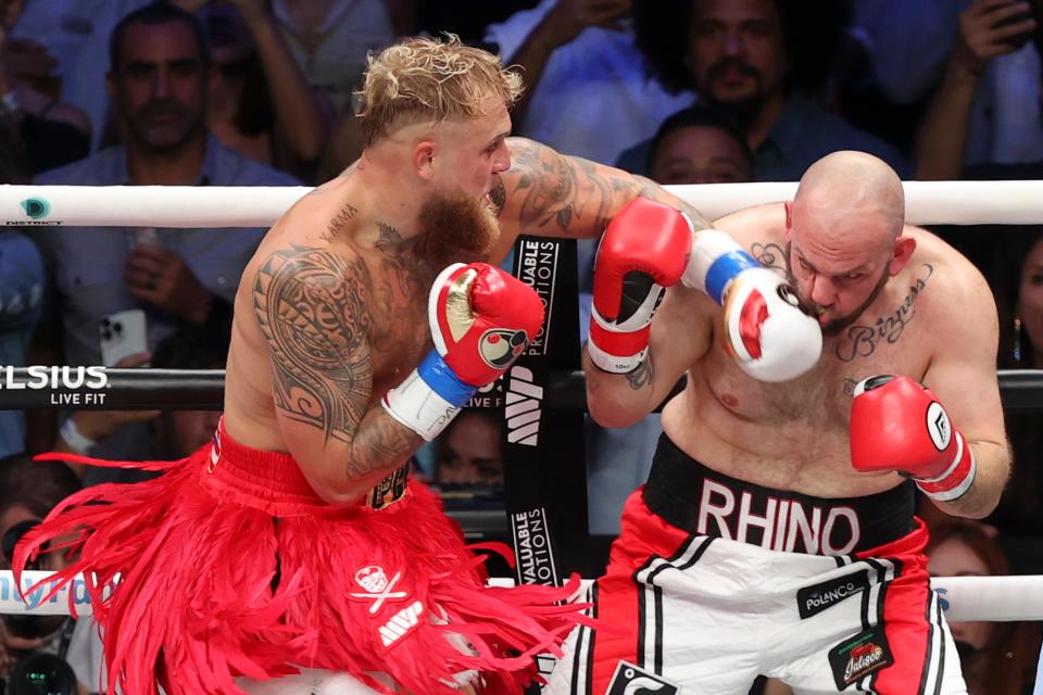 HATO REY, PUERTO RICO - MARCH 2: Jake Paul (Red) punches Ryan Bourland during their cruiserweight fight at Coliseo de Puerto Rico on March 2, 2024 in Hato Rey, Puerto Rico. (Photo by Ricardo Arduengo/Getty Images) ORG XMIT: 776113560 ORIG FILE ID: 2046570513