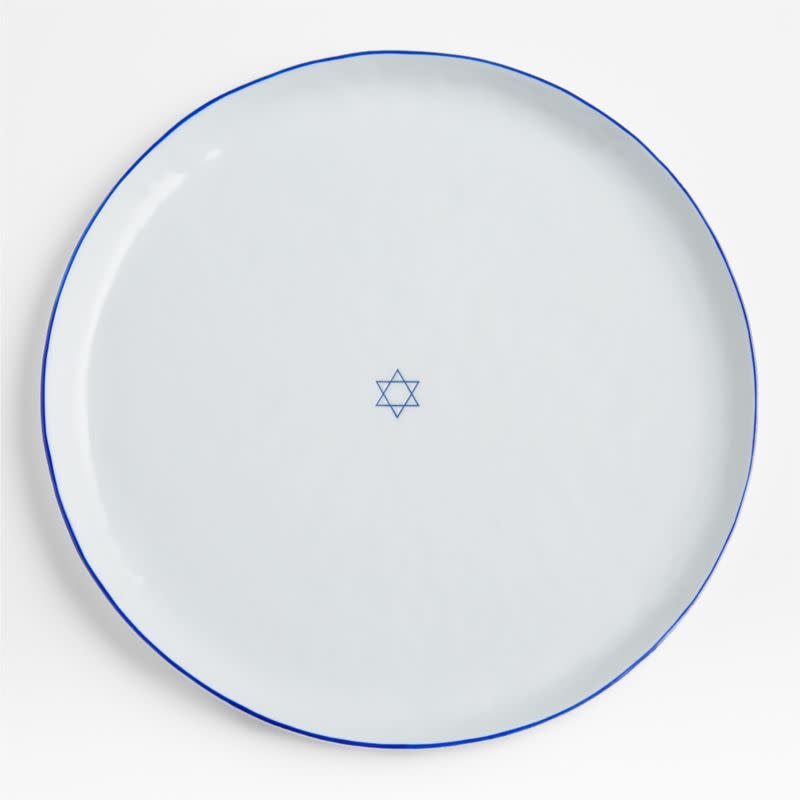 <p><a href="https://go.redirectingat.com?id=74968X1596630&url=https%3A%2F%2Fwww.crateandbarrel.com%2Fmercer-blue-rim-star-of-david-platter%2Fs443537&sref=https%3A%2F%2Fwww.redbookmag.com%2Flife%2Ffriends-family%2Fg46000590%2Fbest-hanukkah-gifts%2F" rel="nofollow noopener" target="_blank" data-ylk="slk:Shop Now;elm:context_link;itc:0;sec:content-canvas" class="link ">Shop Now</a></p><p>Star of David Platter</p><p>crateandbarrel.com</p><p>$34.95</p>