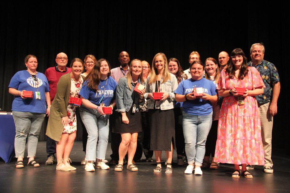 Perry Schools staff members receive 5 years of service awards during a presentation on Wednesday, May 22, 2024.