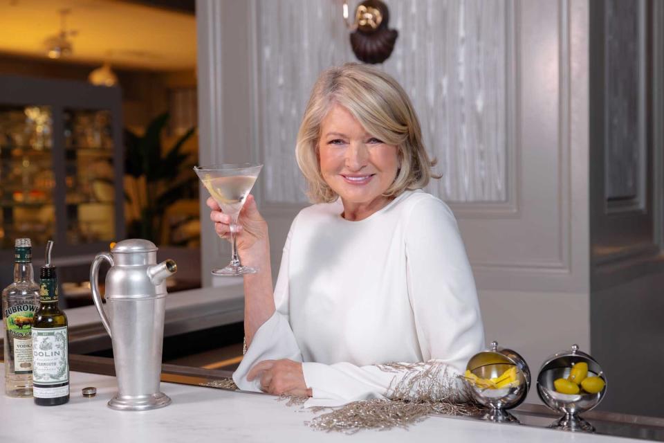 Martha Stewart holding Martha-tini at her Las Vegas restaurant, The Bedford