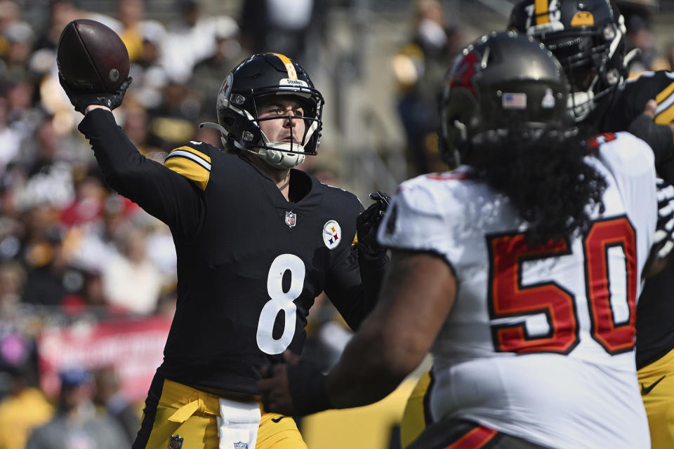 Pittsburgh Steelers quarterback Kenny Pickett (8) throws a pass during the first half of an NFL football game against the Tampa Bay Buccaneers in Pittsburgh, Sunday, Oct. 16, 2022. (AP Photo/Barry Reeger)