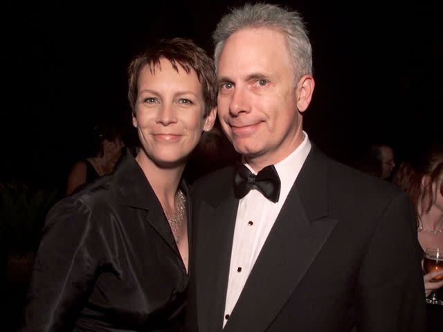 <p>Kevin Winter/Getty </p> Jamie Lee Curtis and husband Christopher Guest at a Comedy Central after party in April 2001.